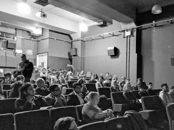 The audience take their seats