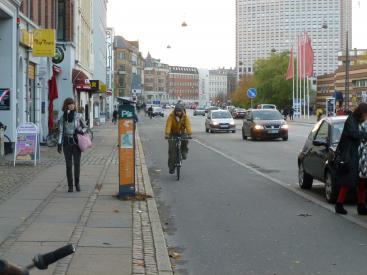 Priority is given to pedestrians, then cyclists, buses and finally cars