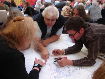 People discuss the masterplan in a consultation session